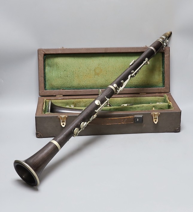 A ‘Superior Class’ Hawkes & Son clarinet and a cased Rampone and Cazzani ‘Judson’ ’ clarinet, 67 cm long.